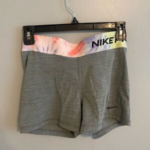Nike Gray Athletic Shorts with Wide Elastic Waistband and Stretchy Material